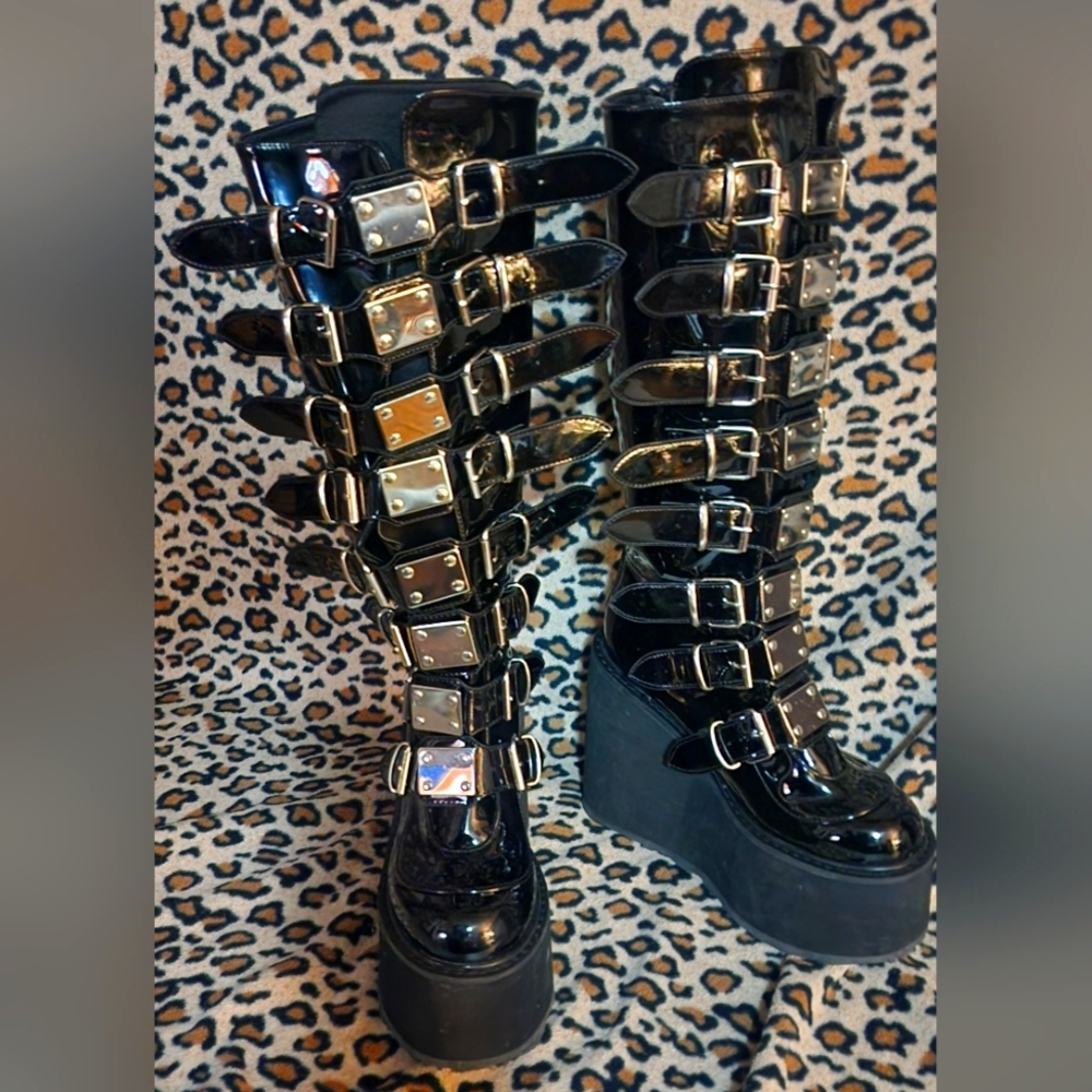 Demonia Swing-815 Wide-Calf Black Patent Combat Boots with Silver Buckles